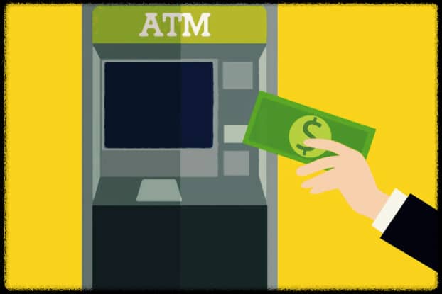 ATM에서 현금 인출하는 사람